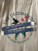 VIP wristbands featuring the tour name flanked on both sides by the tour art (a spray of red flowers and hummingbird) in miniature, The Decemberists / Jake Xerxes Fussell on Aug 6, 2022 [340-small]