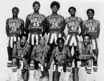 The 1976-77 Harlem Globetrotters: Kneeling (L-R): Nate Branch, Curly Neal, Meadowlark Lemon and Jackie Jackson. Standing (L-R): Dallas Thornton, Edmond Lawrence, Robert Paige, Twiggy Sanders and Jerry Venable., tags: Harlem Globetrotters - Harlem Globetrotters on Oct 31, 1977 [460-small]