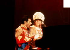 Freddie Mercury in the Rock n' Roll encore with Elton John in his side, Elton John on Nov 19, 1982 [911-small]