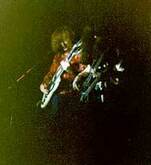 Taken with a 110 Instamatic, no flash... Alex & Geddy on their respective Double-Neck guitars., Rush / Pat Travers on Nov 18, 1978 [179-small]